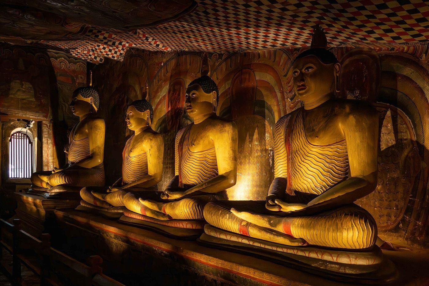 Buddha statues inside the Dambulla cave temple