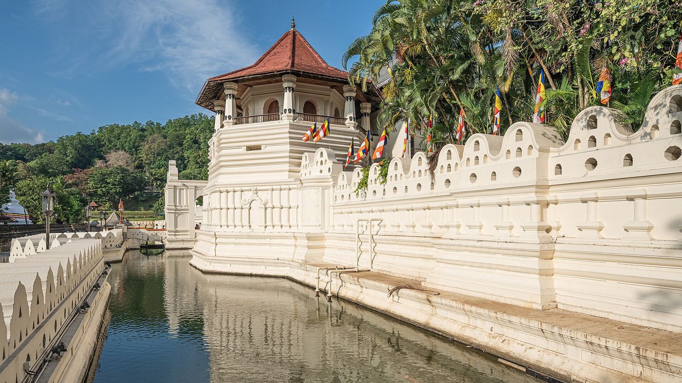 The Temple of the Tooth and its moat in Kandy